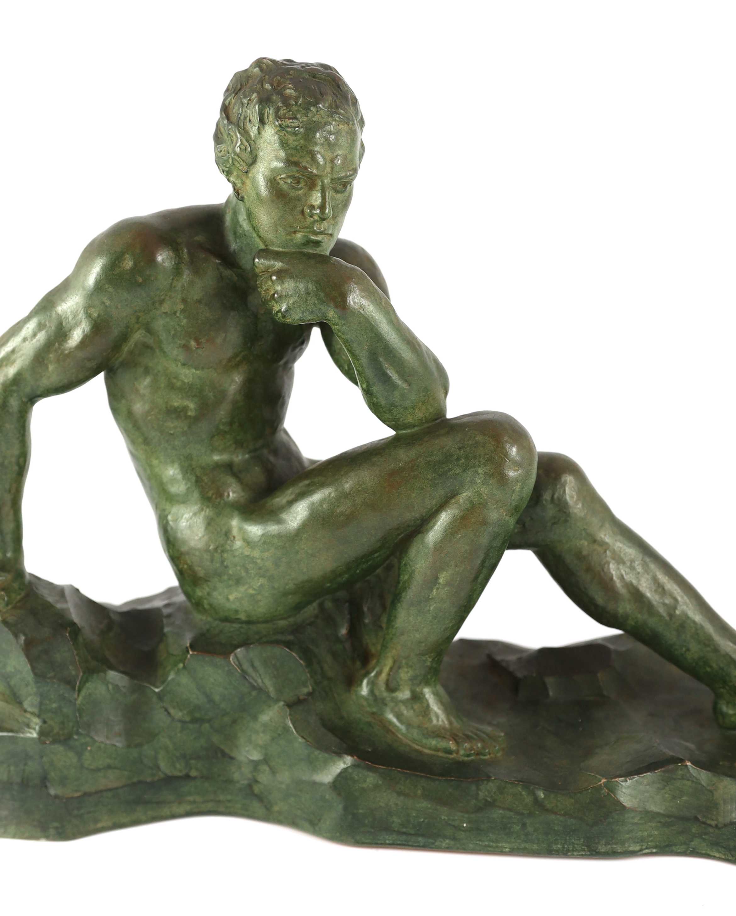 Alexandre Ouline (French, fl.1918-1940). An Art Deco bronzed terracotta sculpture, signed, 50cm wide, 15cm deep, 35cm high